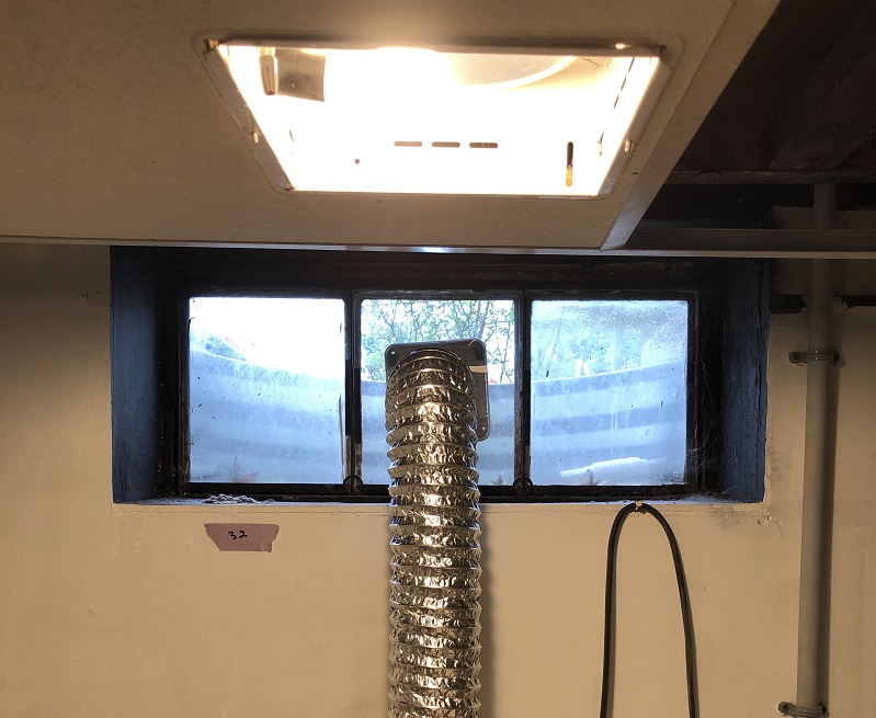 Basement window replacement with a dryer vent 